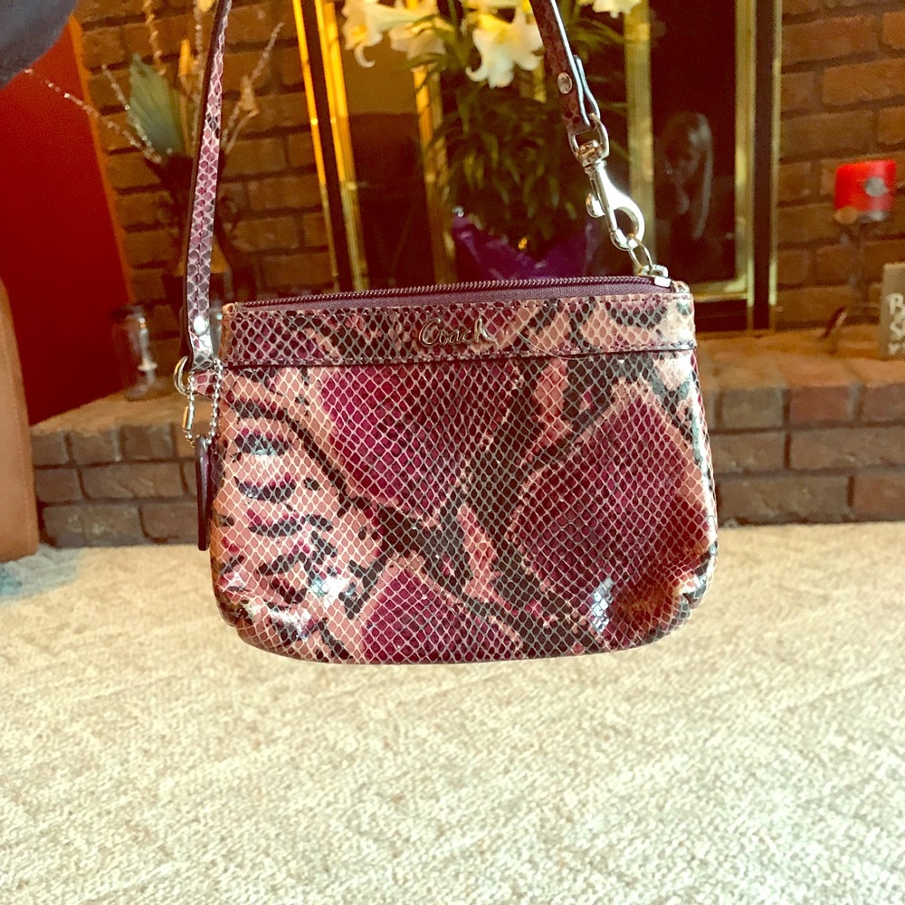 Two Coach wristlets